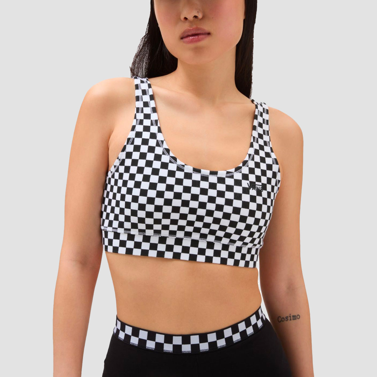 http://us.rollersnakes.com/cdn/shop/files/vans-flying-v-print-sports-bra-black-white-checkerboard-womens-01.jpg?v=1686839556&width=2048
